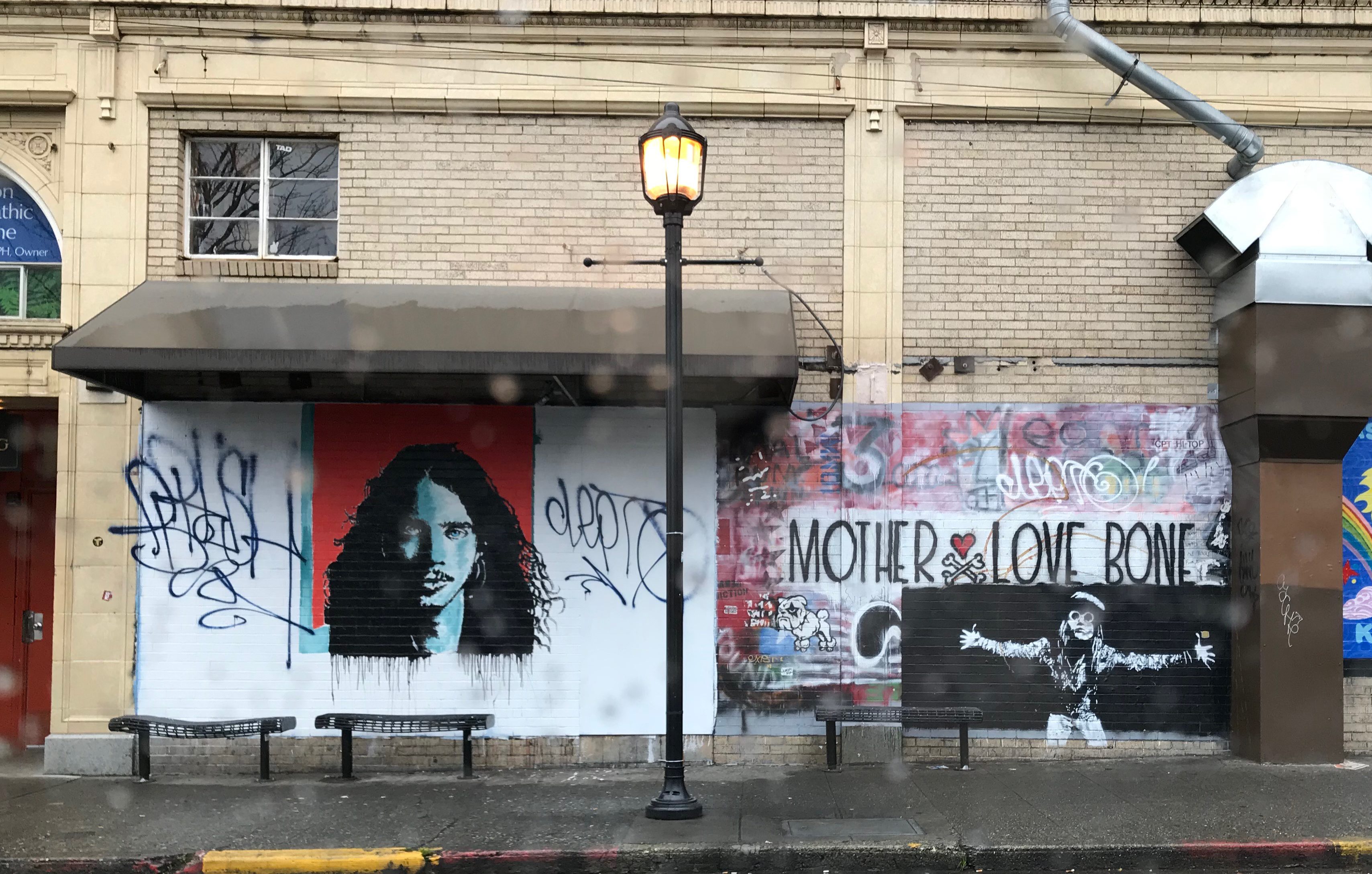 Murals of Chris Cornell and Andy Wood outside of Easy Street Records in West Seattle.